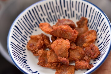 Deep fried crispy pork belly, Crispy Fried Pork Belly with Chili Sauce, Deep fried crispy pork belly sliced cooked with salt and Thai spicy dipping sauce