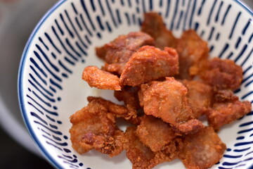 Deep fried crispy pork belly, Crispy Fried Pork Belly with Chili Sauce, Deep fried crispy pork belly sliced cooked with salt and Thai spicy dipping sauce