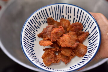 Deep fried crispy pork belly, Crispy Fried Pork Belly with Chili Sauce, Deep fried crispy pork belly sliced cooked with salt and Thai spicy dipping sauce