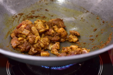 Spicy stir fried pork with Cluster Bean (Bitter Bean or stink beans) popular southern Thai food, Spicy stir fried chicken with Cluster Bean (Bitter Bean or stink beans).Thai southern food