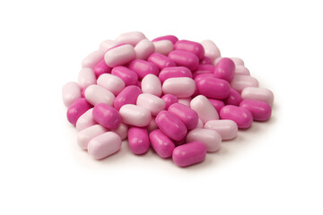 Sweet multicolored candies isolated on white background.