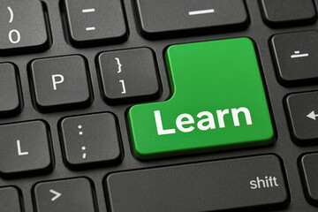 Green learn key on black keyboard technology computer