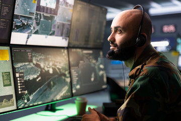Counterintelligence agency agent relays information from army intelligence analysts to front lines...