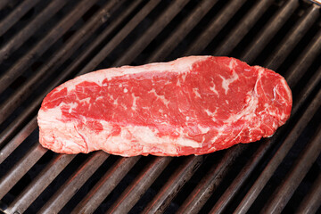 Juicy steak on a grill