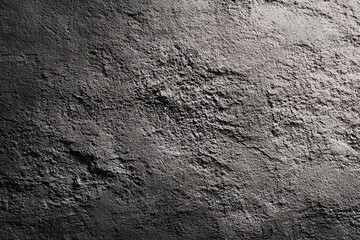 Textured gray wall showcases intricate details and shadow play in a realistic setting, creating a unique aesthetic environment for design inspiration