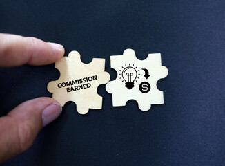  wooden puzzle with icons and icon Commission Earned