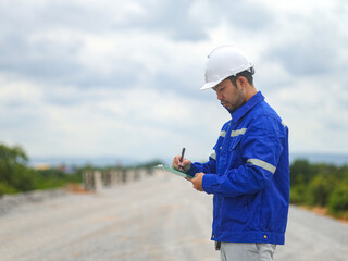 Constructor Engineer Man Using tablet Construction Site