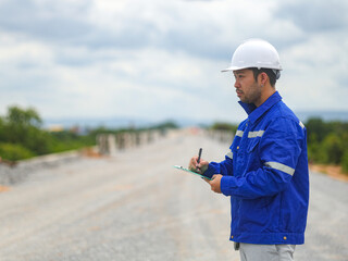 Constructor Engineer Man Using tablet Construction Site