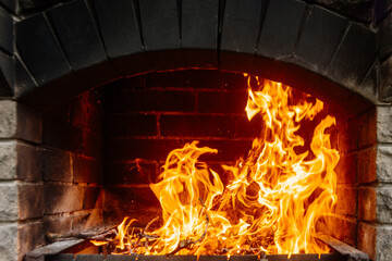 Close-up of fire flames in a barbecue.