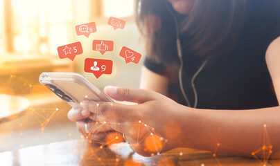 Women holding smartphones and using social media network applications or interacting with friends...