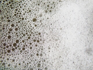 The texture of white foam in water