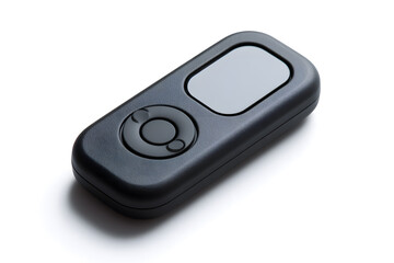 Obraz premium Black Bluetooth camera remote for smartphone photography. Compact and modern design, isolated on white background.