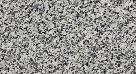 Obraz premium Close-up of speckled gray granite texture with detailed pattern