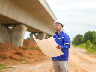 Back one architect standing outdoor at home building construction site