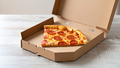 Pepperoni pizza slice in cardboard box. Tasty fast food. Delicious snack. Cooking and culinary