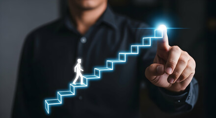 Close-up of a hand pointing at a glowing staircase with a person walking up