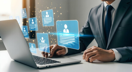 Businessman using laptop with profile icons overlay