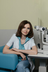 Woman undergoing professional eye exam with advanced ophthalmology diagnostic equipment
