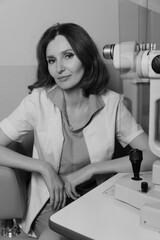 Woman undergoing professional eye exam with advanced ophthalmology diagnostic equipment