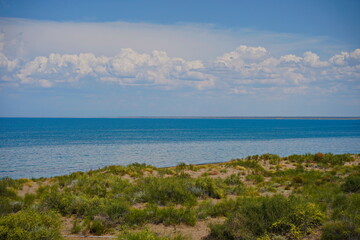 The shore of Lake Balkhash. Summer beach vacation.