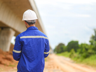 Engineer taking notes On Construction Site. Profession,construction site