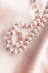 Pink pearl on silk