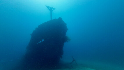 Silhouette of sunken ship underwater. Sunken ship underwater. Sunken ship background. Wreck...