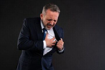 Businessman having chest pain