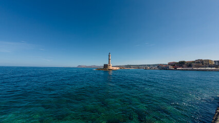 The Venetian lighthouse in Chania stands proudly at the harbor entrance, blending history and beauty