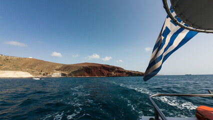 Red Beach in Santorini is famous for its striking red volcanic cliffs and crystal-clear blue...