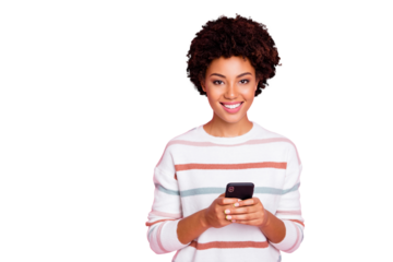 Photo of pretty dark skin curly lady holding telephone addicted to internet reposts and comments wear white striped pullover isolated pastel pink color background