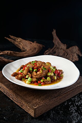 Delicious stir-fried pork trotters with rice pepper and garlic sprouts