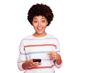 Photo of pretty dark skin curly lady holding telephone watching likes reading comments wear white...