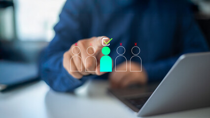 Hand selecting a highlighted candidate icon with a checkmark among others on a virtual screen....