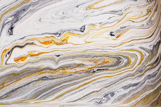 Abstract acrylic paint with flowing patterns