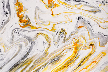 Abstract acrylic paint background in swirling patterns