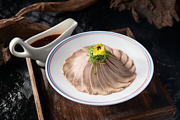 Fine Chinese cold dish spiced beef tongue slices with sauce