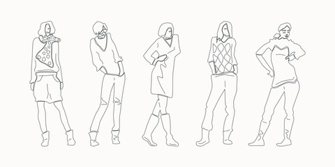 illustration of girls standing in different poses. Hand-drawn graphics in thin line stile. Isolated on white background