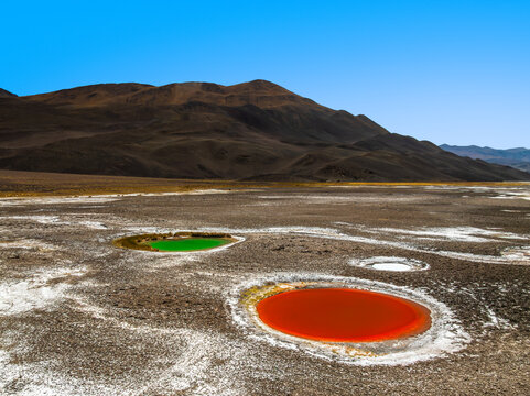 Colorful saline ponds in the arid La Puna landscape
