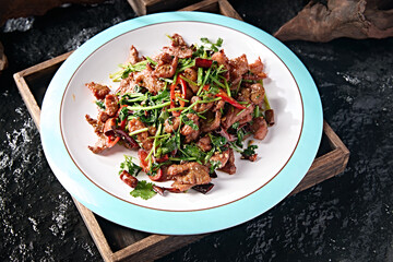 Chinese Hunan cuisine stir-fried beef with chili and coriander