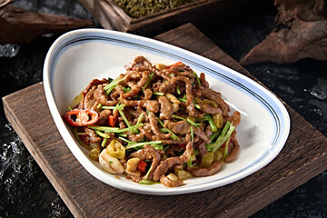 Chinese food Hunan style stir-fried beef tenderloin with pickled pepper and coriander