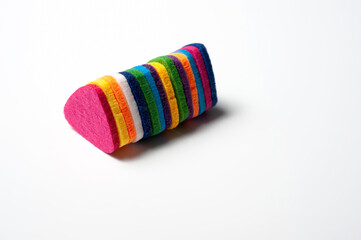 Felt picks in different colors for playing the ukulele or other string instruments.