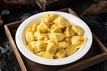 Whole grain cornmeal dumplings with pork and sauerkraut