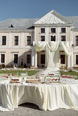 Outdoor Banquet with Fresh Fruits and Castle View