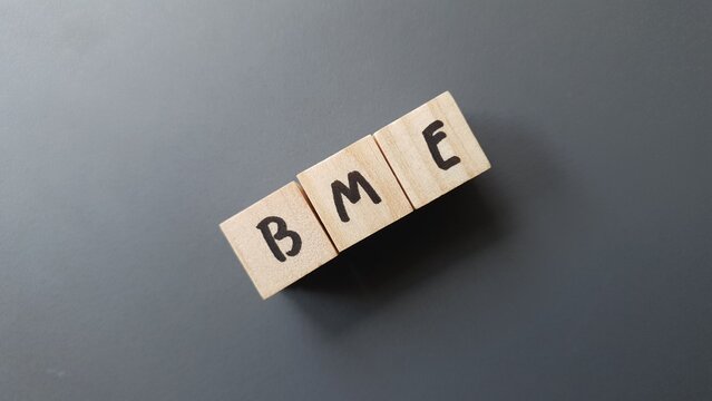 BME acronym made of wooden letter cubes on dark background. Bolsas y Mercados Espa&ntilde;oles (Spanish Stock Exchanges and Markets)