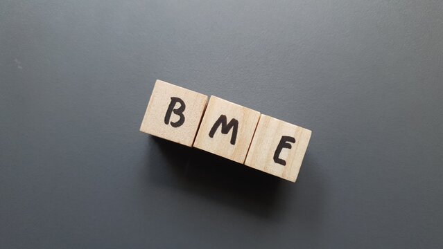 BME acronym made of wooden letter cubes on dark background. Bolsas y Mercados Espa&ntilde;oles (Spanish Stock Exchanges and Markets)