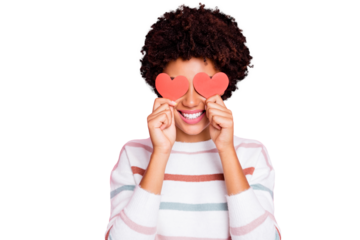 Photo of pretty dark curly skin lady holding in hands little red paper hearts hiding flirty eyes wear white striped pullover isolated pastel pink color background
