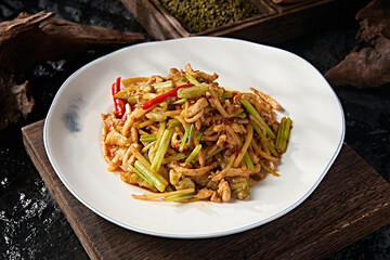 Chinese food Hunan style stir-fried pork tenderloin with pickled pepper and celery