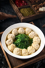 Chinese Huaiyang cuisine soup with vegetables and chopped pork