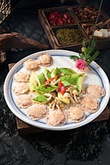 Chinese Cantonese cuisine Zucchini, white mushroom, lotus root slices, fried water chestnut and shrimp cakes